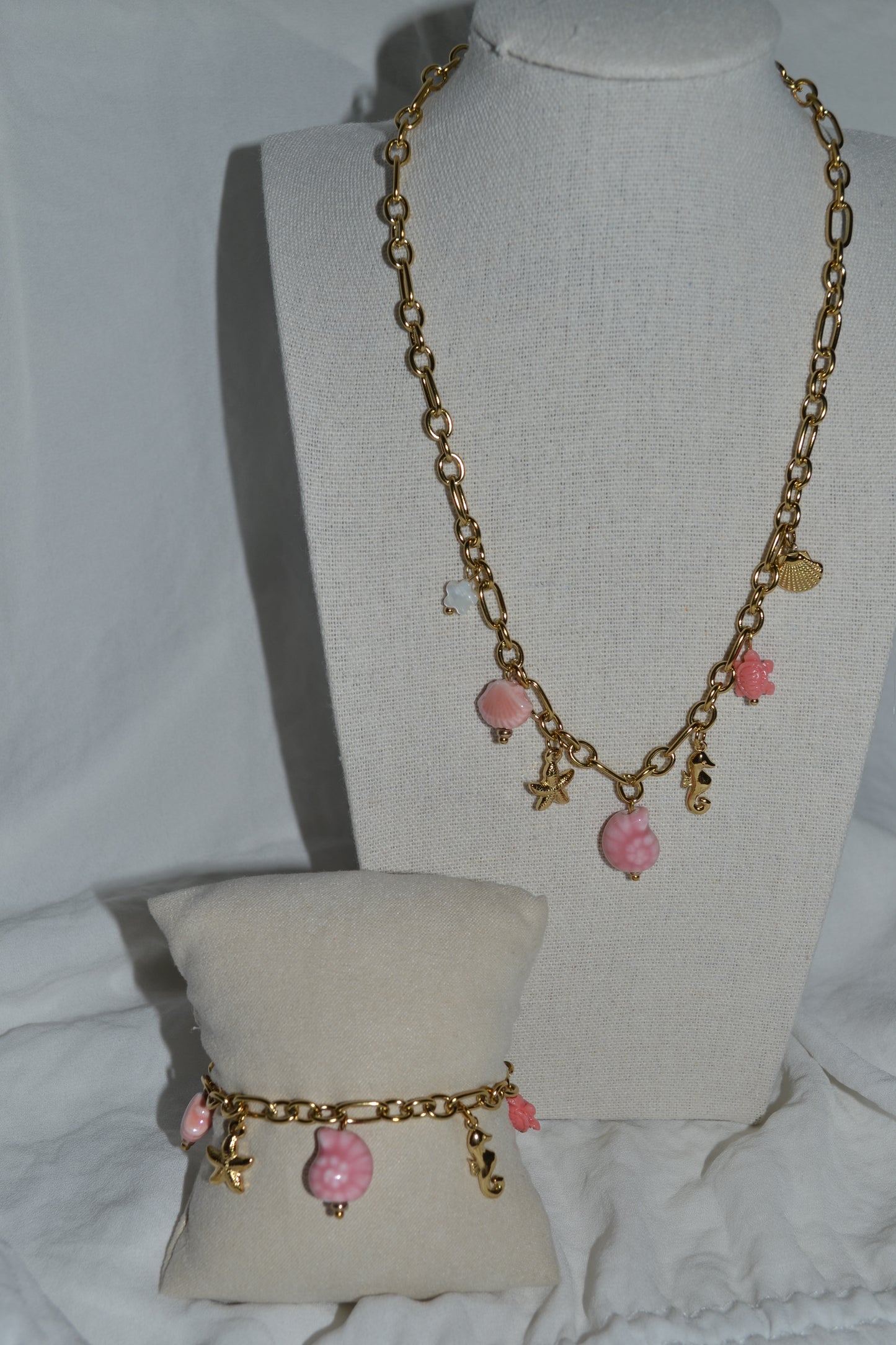 Bracelet breloque coquillage rose