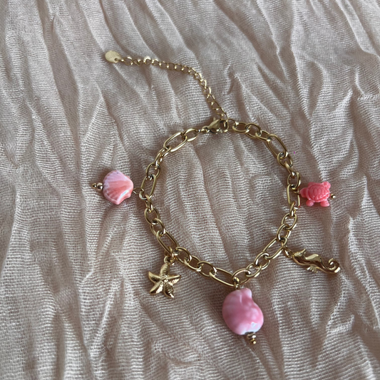 Bracelet breloque coquillage rose